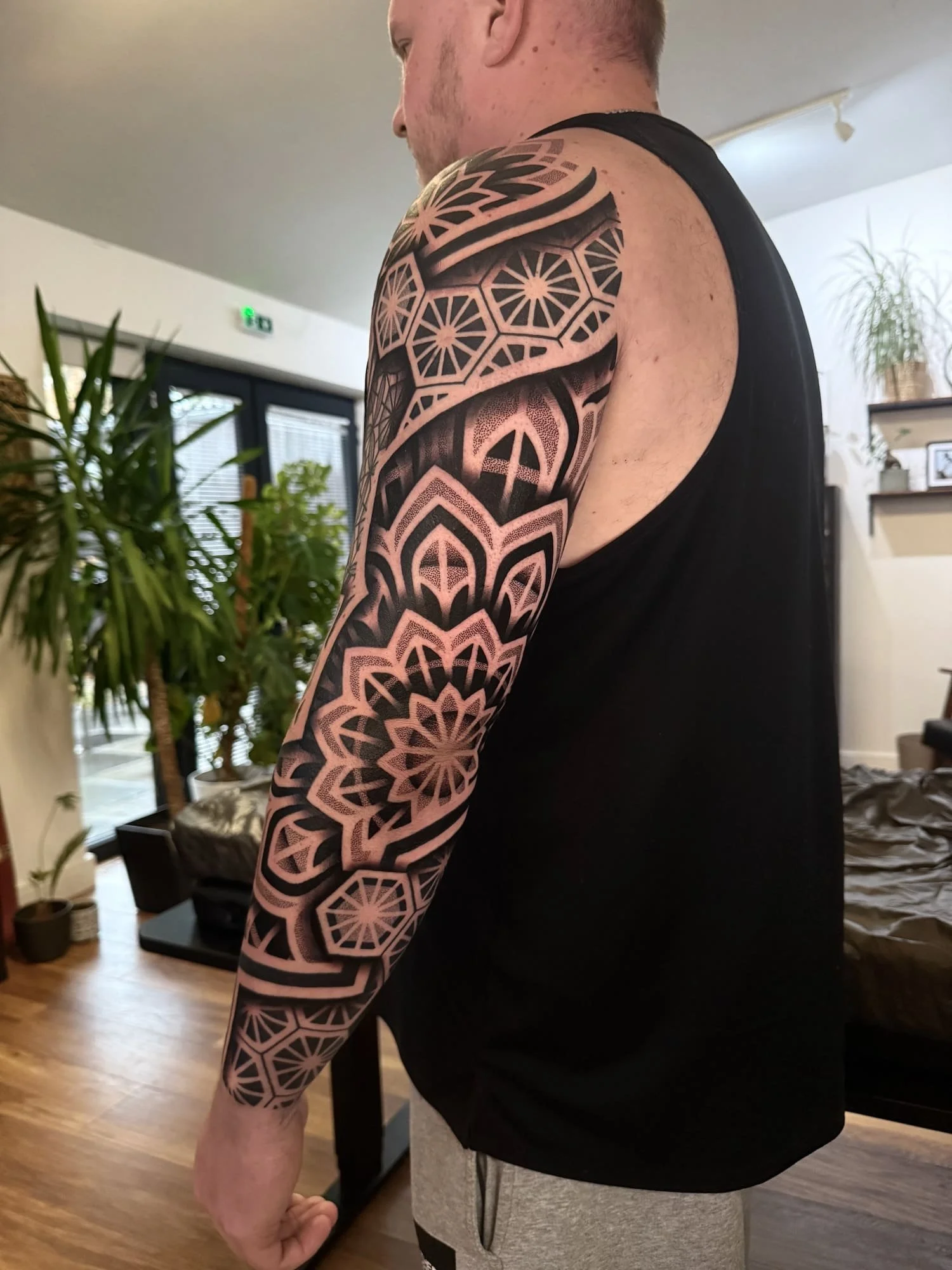 geometric-full-sleeve-elbow-mandala-devon-uk-custom-tattoo-ideas.jpg