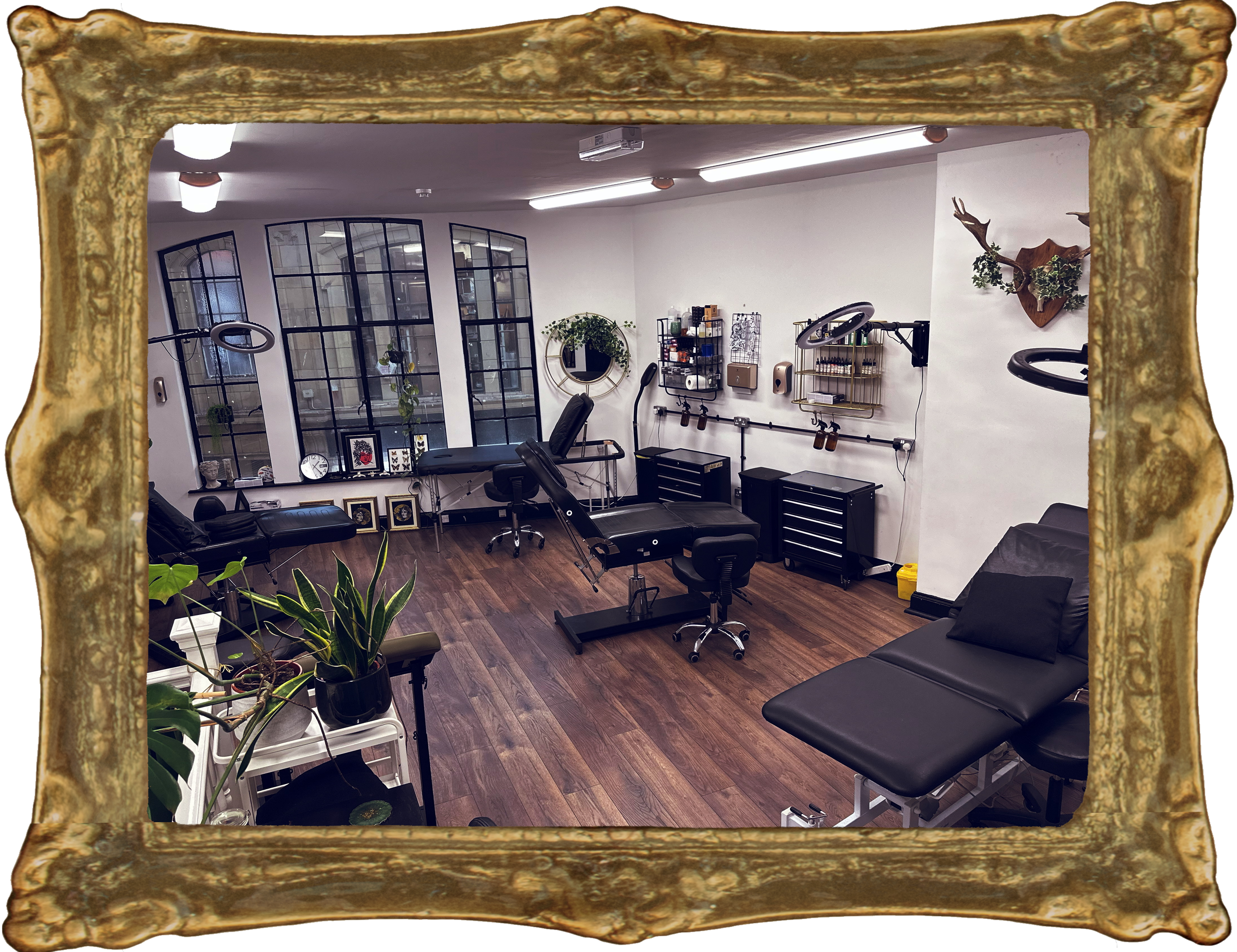 Heart of Glass studio tattoo beds in gold frame