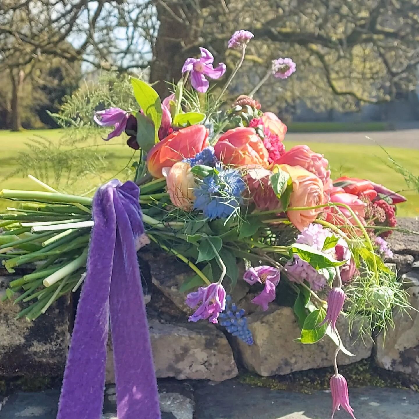 A beautiful bright day in the lakes yesterday. Enjoyed making this colourful bridal bouquet with the most exquisite tulips, such an under rated flower. #underratedtulips #flowerschool #heatherandmoss #tallulahroseflowerschool #heatherandmossflowers #