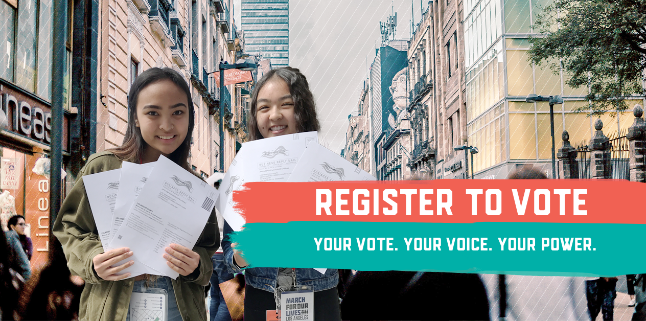 Two individuals smiling and holding voter materials in an urban street, with text "Register to Vote. Your Vote. Your Voice.Your Power"" overlaying the image.