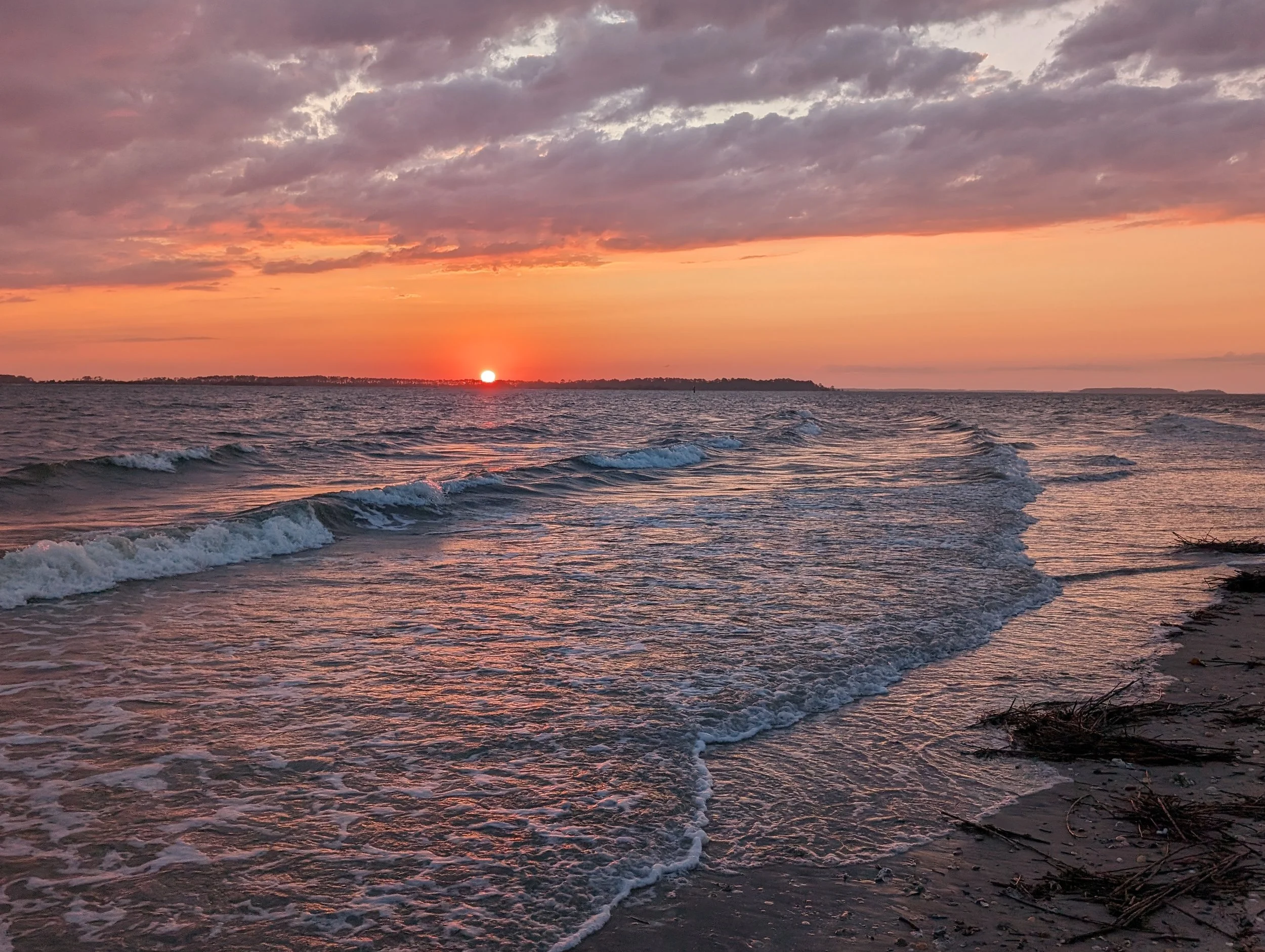 Sunset on the beach with waves on Edisto Beach, SC