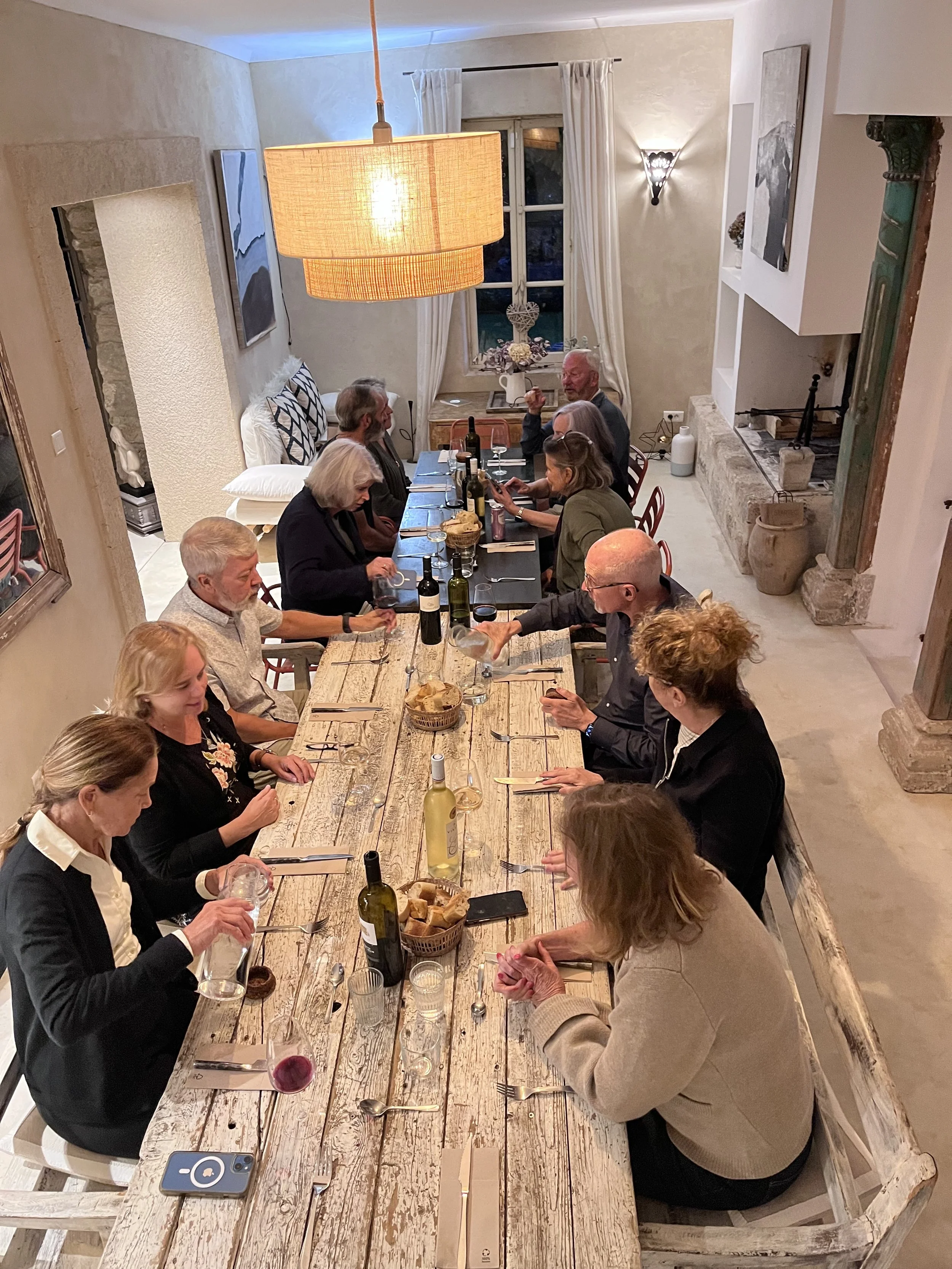 All of us around the table, with Chef Pascal as our guide for the evening
