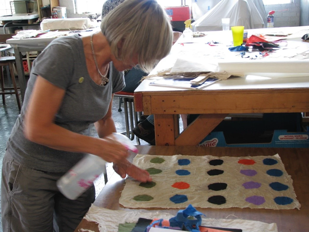 aimee-lee-student-spraying-joomchi-dots.jpeg