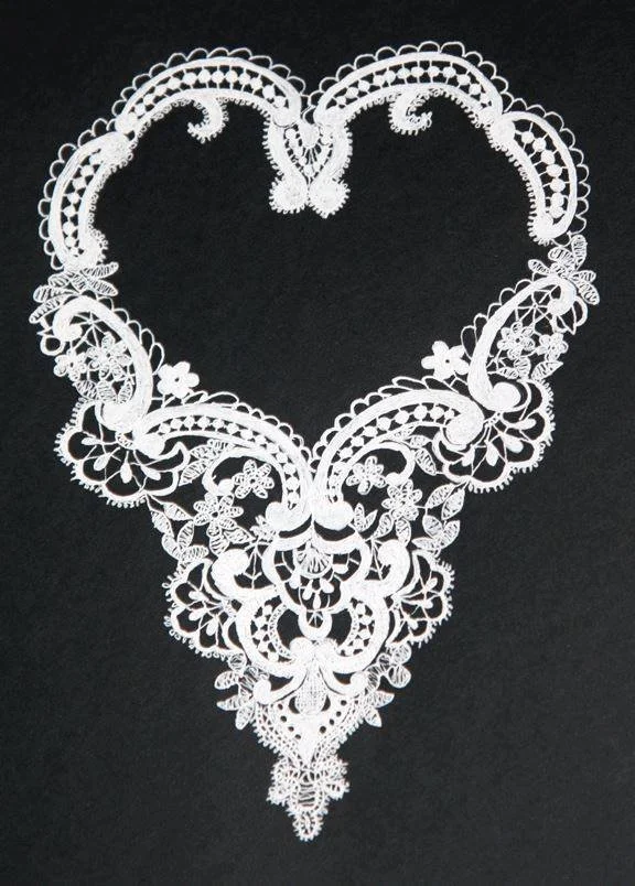 pen and ink (white ink) on black paper of lace