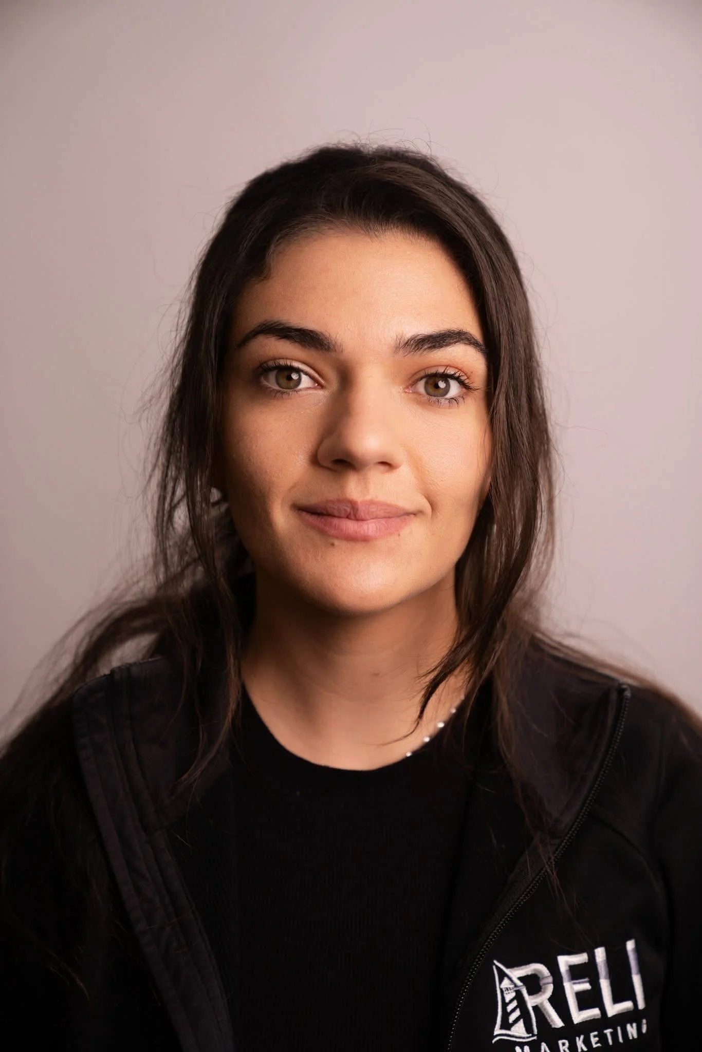 headshot of Jae Baldizzi