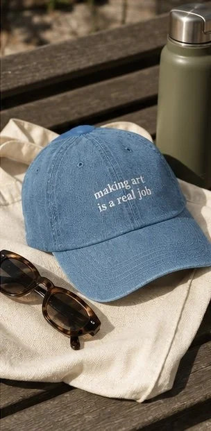 making art is a real job hat