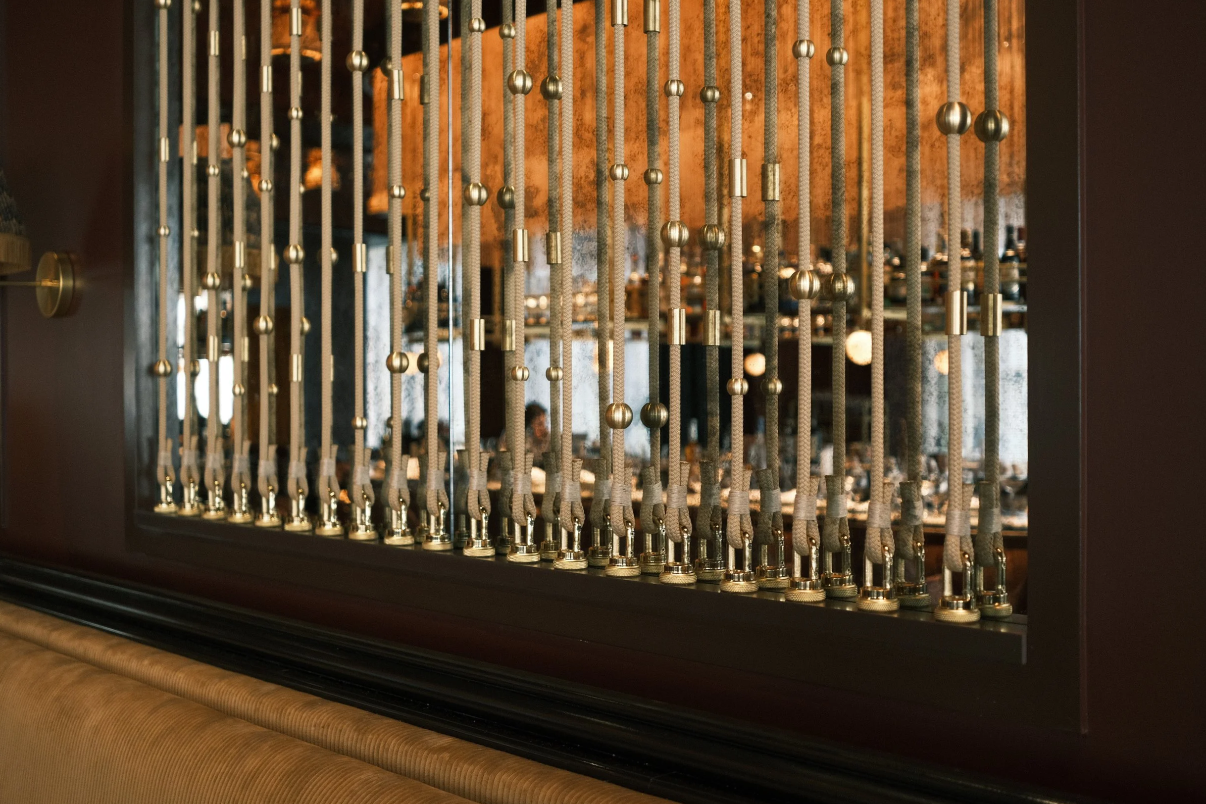 Commercial rope brass and fringe lighting installation restaurants hospitality Boston