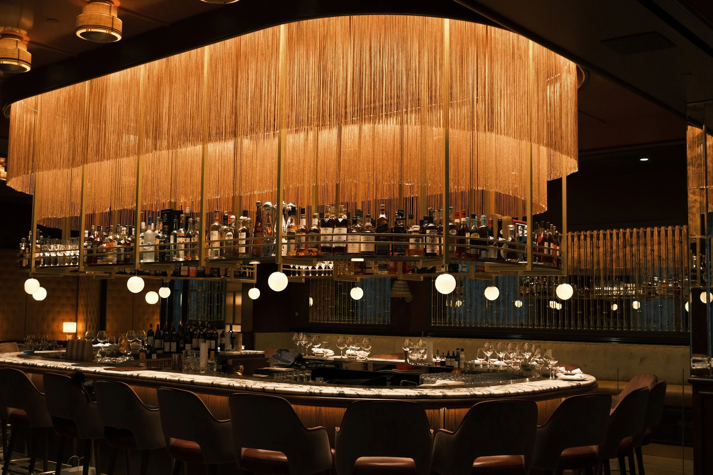 Commercial rope brass and fringe lighting installation restaurants hospitality Boston