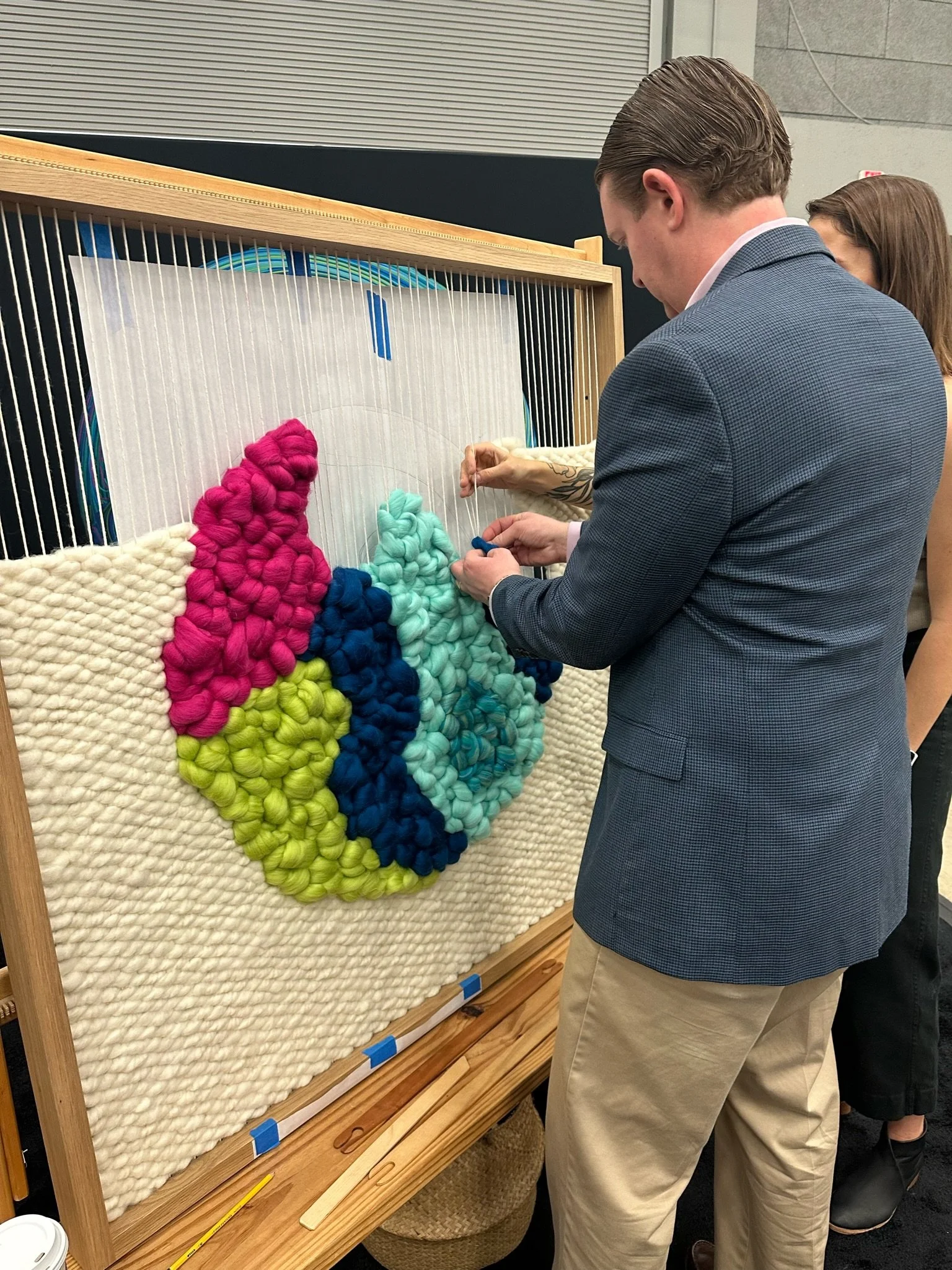 In-Progress Custom Wooden Framed Weaving by FIBROUS for Deloitte Woven Together at Texas Women's Conference in Austin, TX