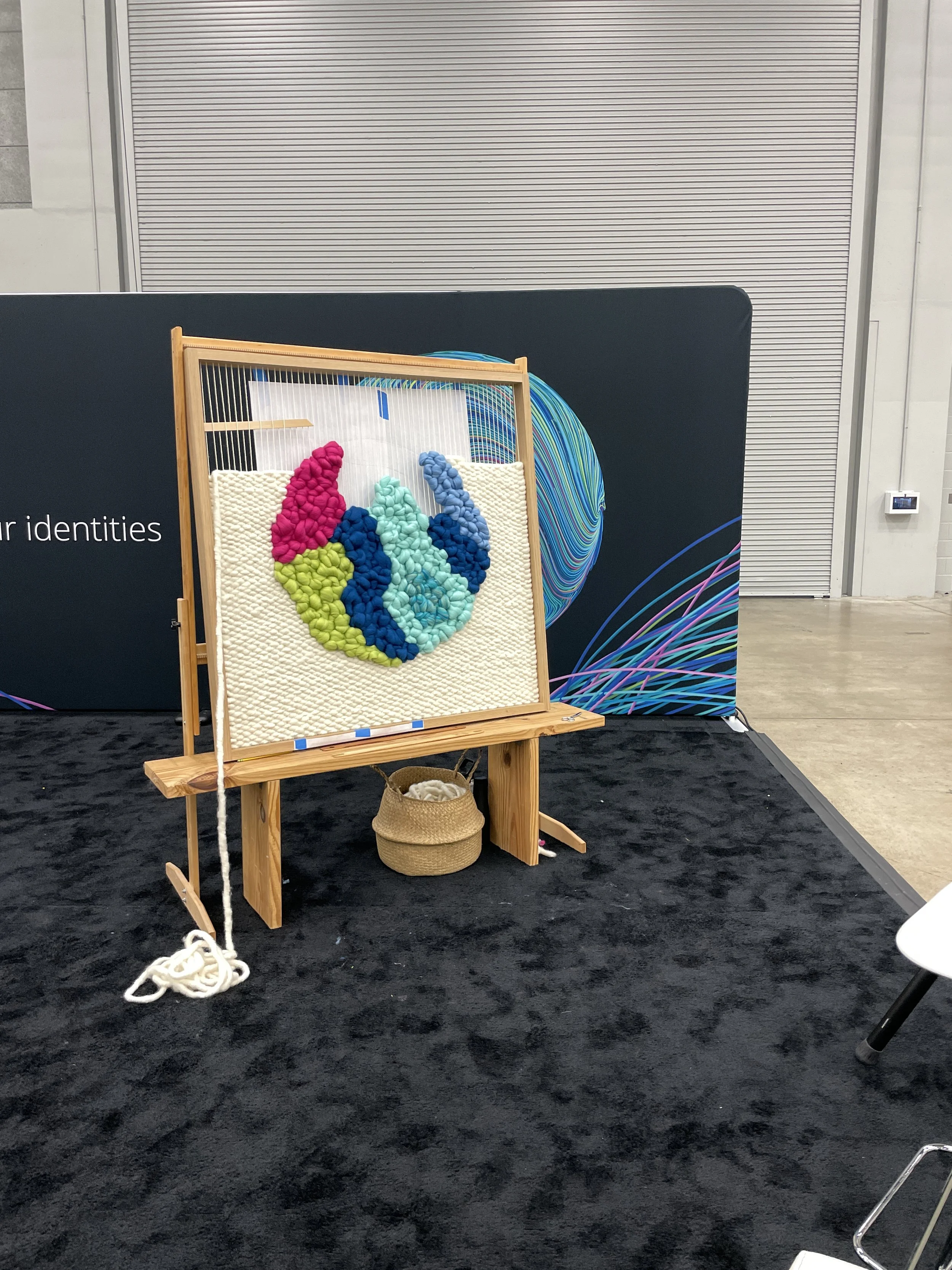 In-Progress Custom Wooden Framed Weaving by FIBROUS for Deloitte Woven Together at Texas Women's Conference in Austin, TX