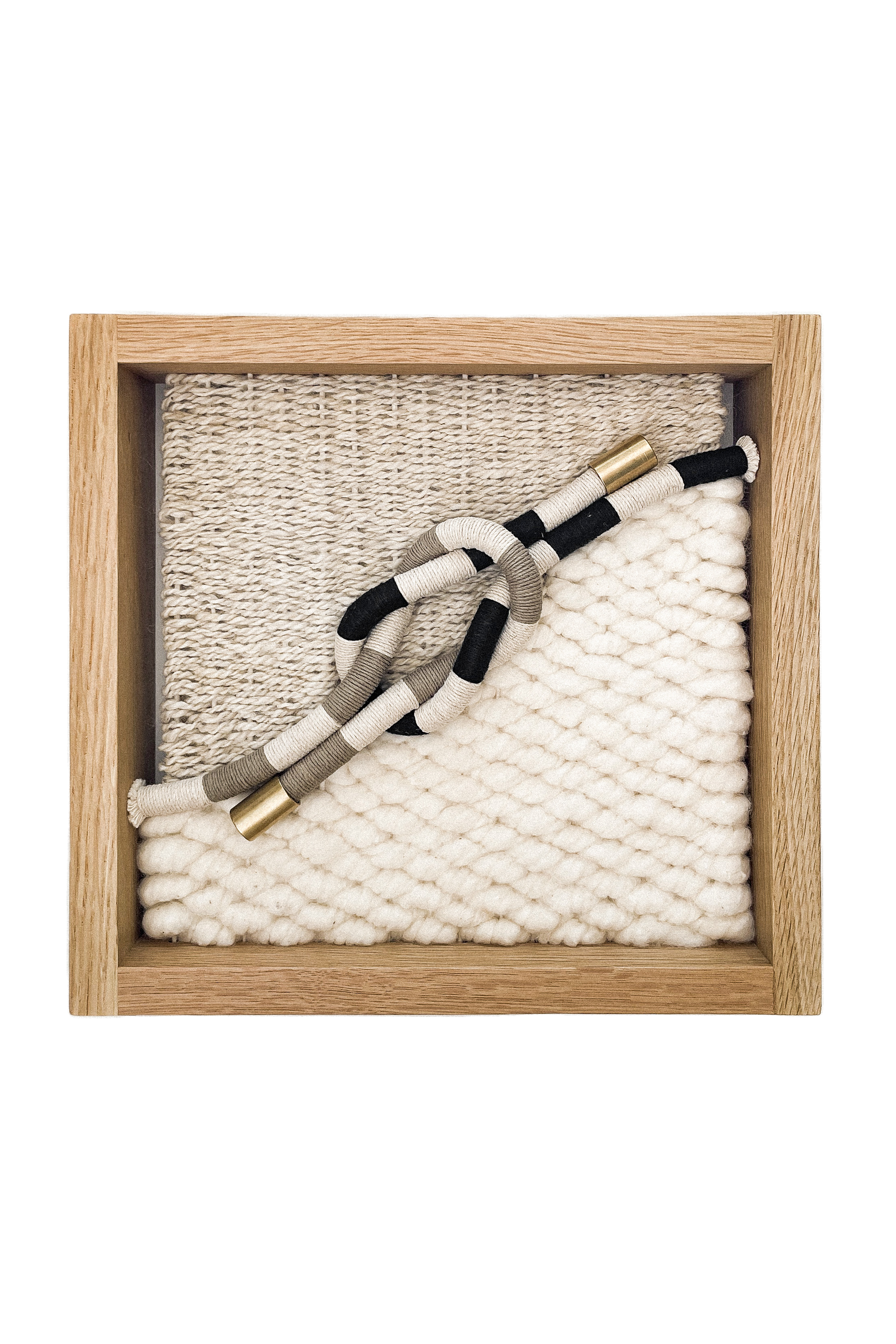 Handwoven white oak framed art collection by FIBROUS natural fibers wool cotton hemp linen brass