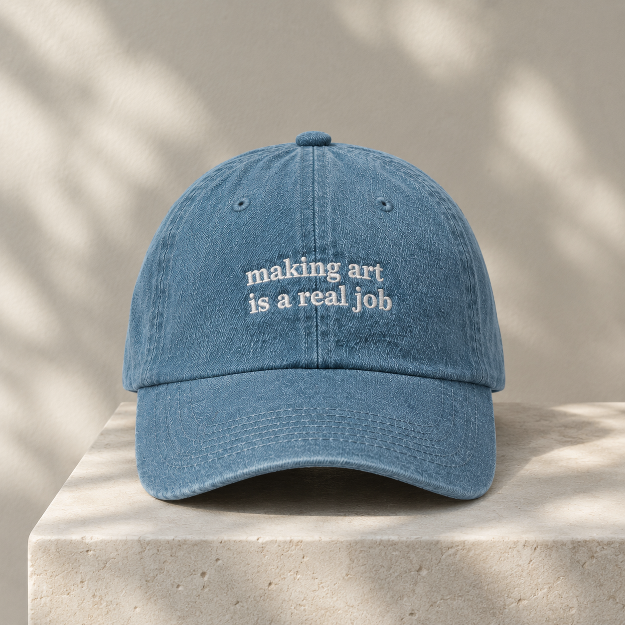 making art is a real job hat