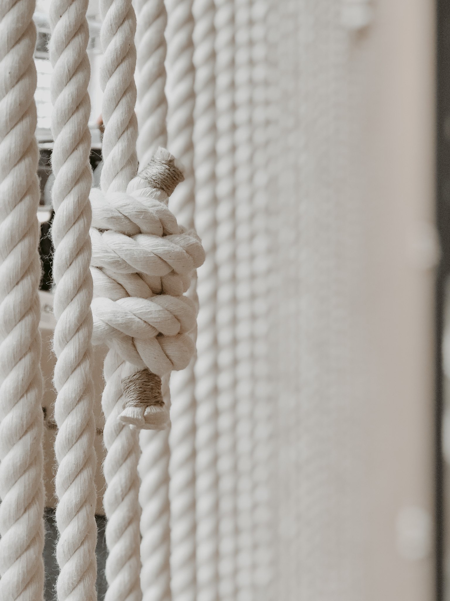 Detail of H-E-B Digital Favor Eastside Tech Hub knotted rope wall partition installation by FIBROUS