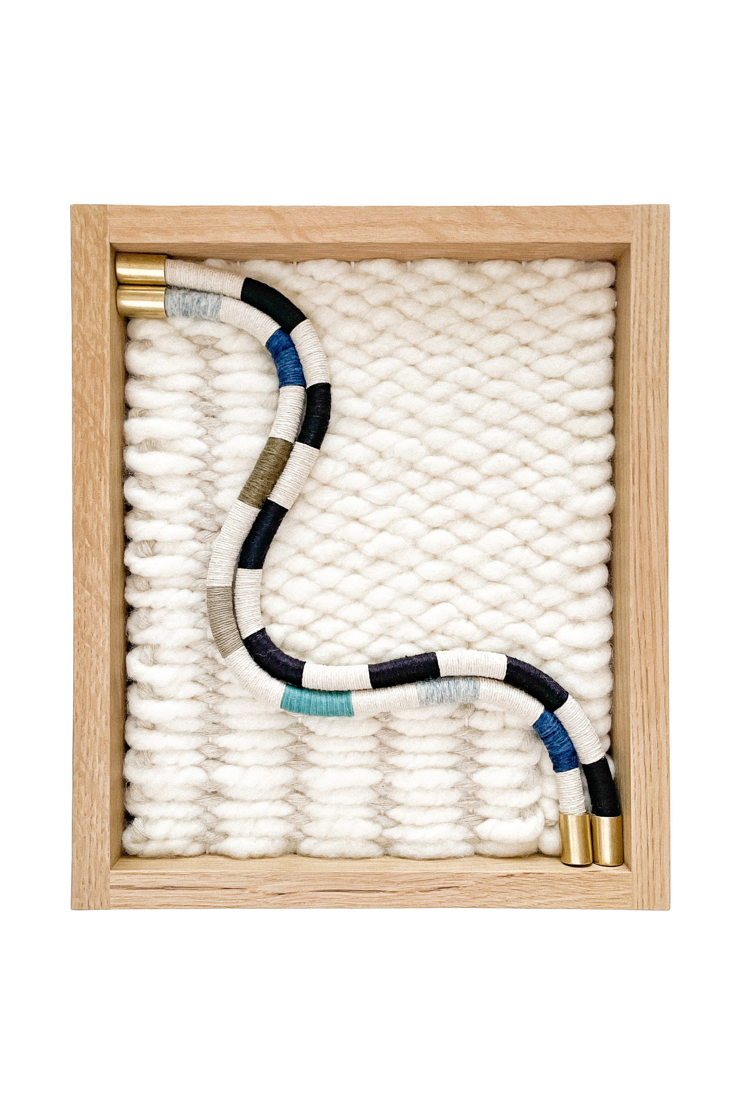 Handwoven white oak framed art collection by FIBROUS natural fibers wool cotton hemp linen brass