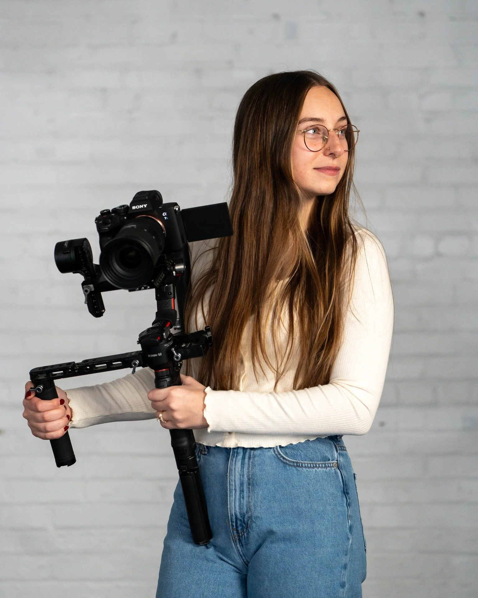 Meet Makayla, our Owner &amp; Lead Filmmaker here at Linen &amp; Lace Studio 🎥✨ She's the organizational mastermind behind the scenes and the key person you'll chat with when you inquire! When she's not filming or editing, she's likely cuddling with