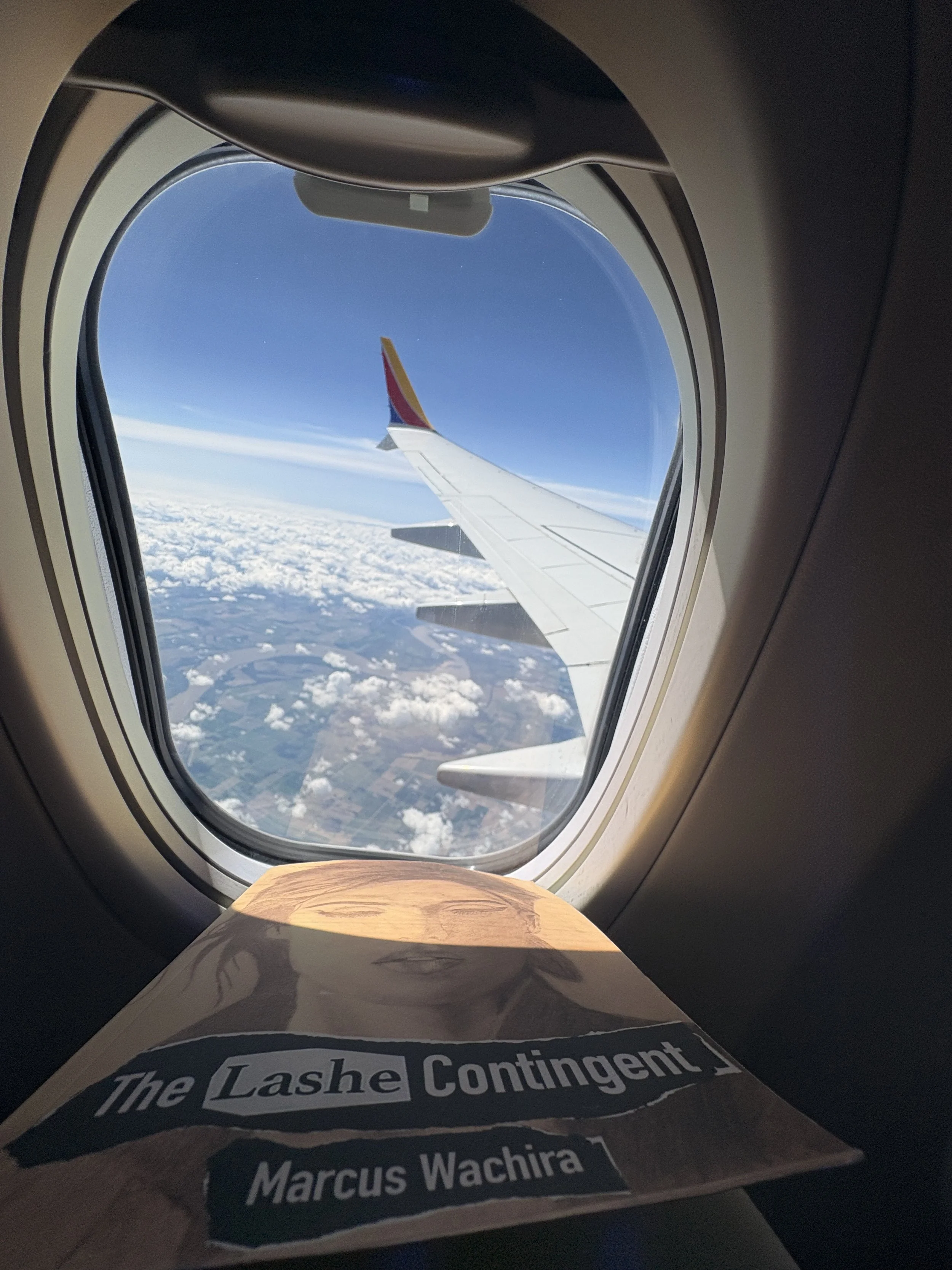 A Reader in the clouds, above the Mississippi River, MS, USA (6/26/25)