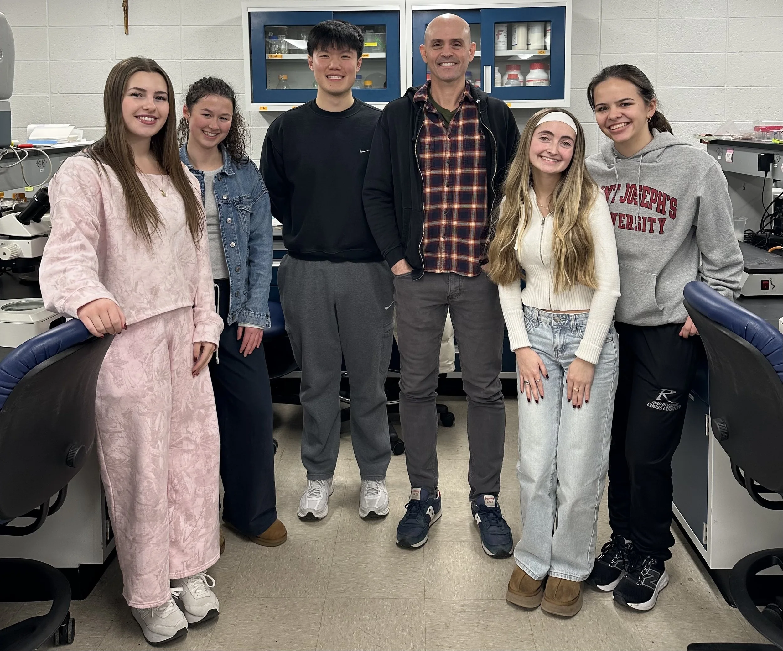 Some of the 2025 Science Outreach Team, with Outreach leader Andren Chen. 