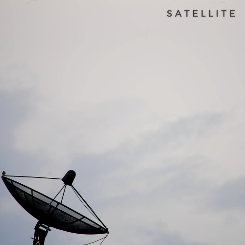 A satellite dish pointing upwards against a cloudy sky with the word "SATELLITE" written in the top right corner.