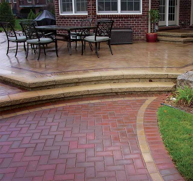 Brick Paver Patio; Raised Brick Paver Patio; Multi-tiered Brick Paver Patio; Brick Paver Steps; Herringbone Brick Paver Patio; Herringbone Paver Patio; Landscape and Landscape Lighting installed in Huntington Woods, Michigan.
