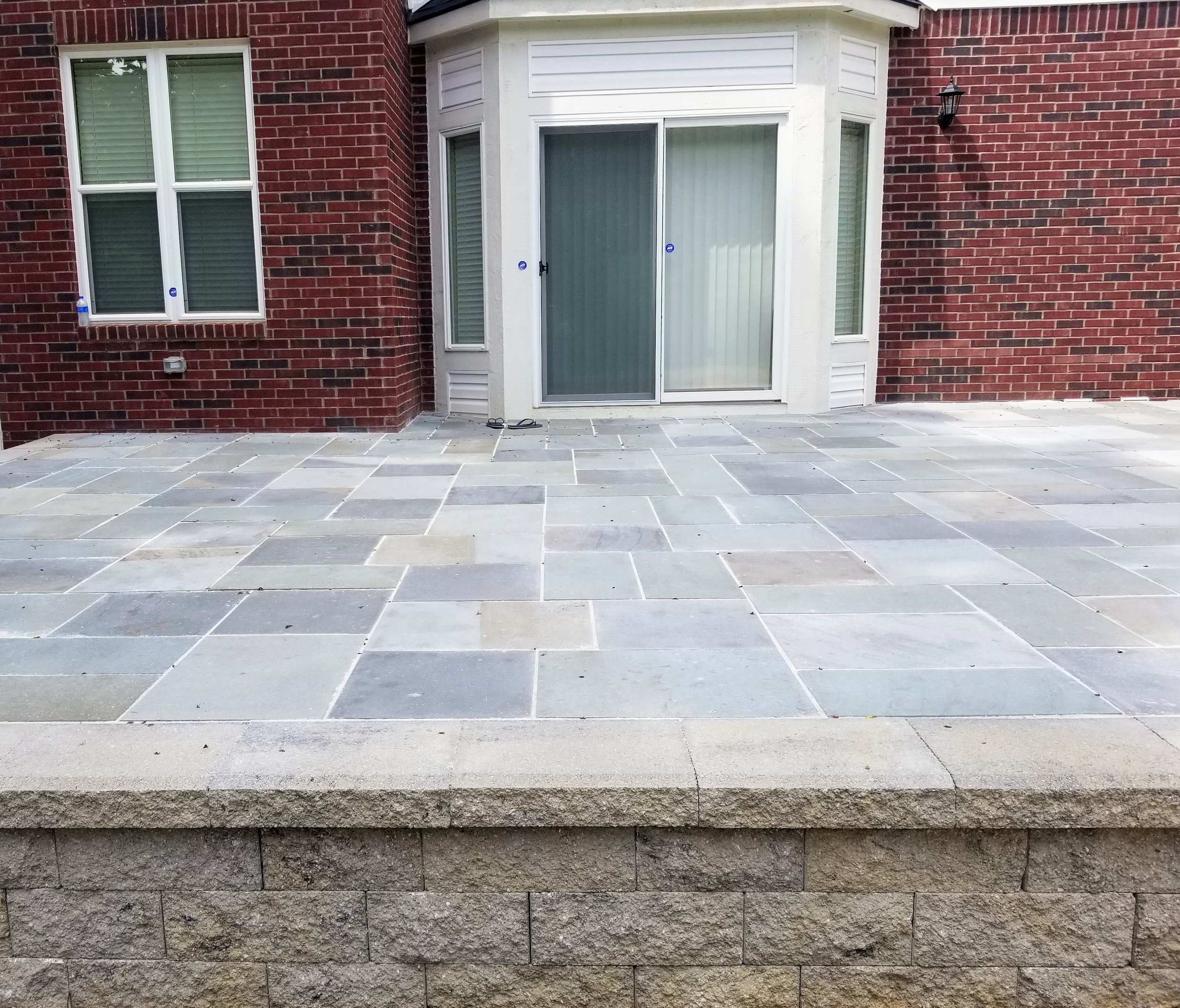 Brick Paver Patio; Large Format Brick Paver Patio; Bluestone Patio; Bluestone Brick Paver Patio; Bluestone Paver Patio; Irregular Brick Paver Patio; Brick Paver Retaining Wall; Brick Paver Seat Wall; Raised Brick Paver Patio; Multi-Tiered Brick Paver