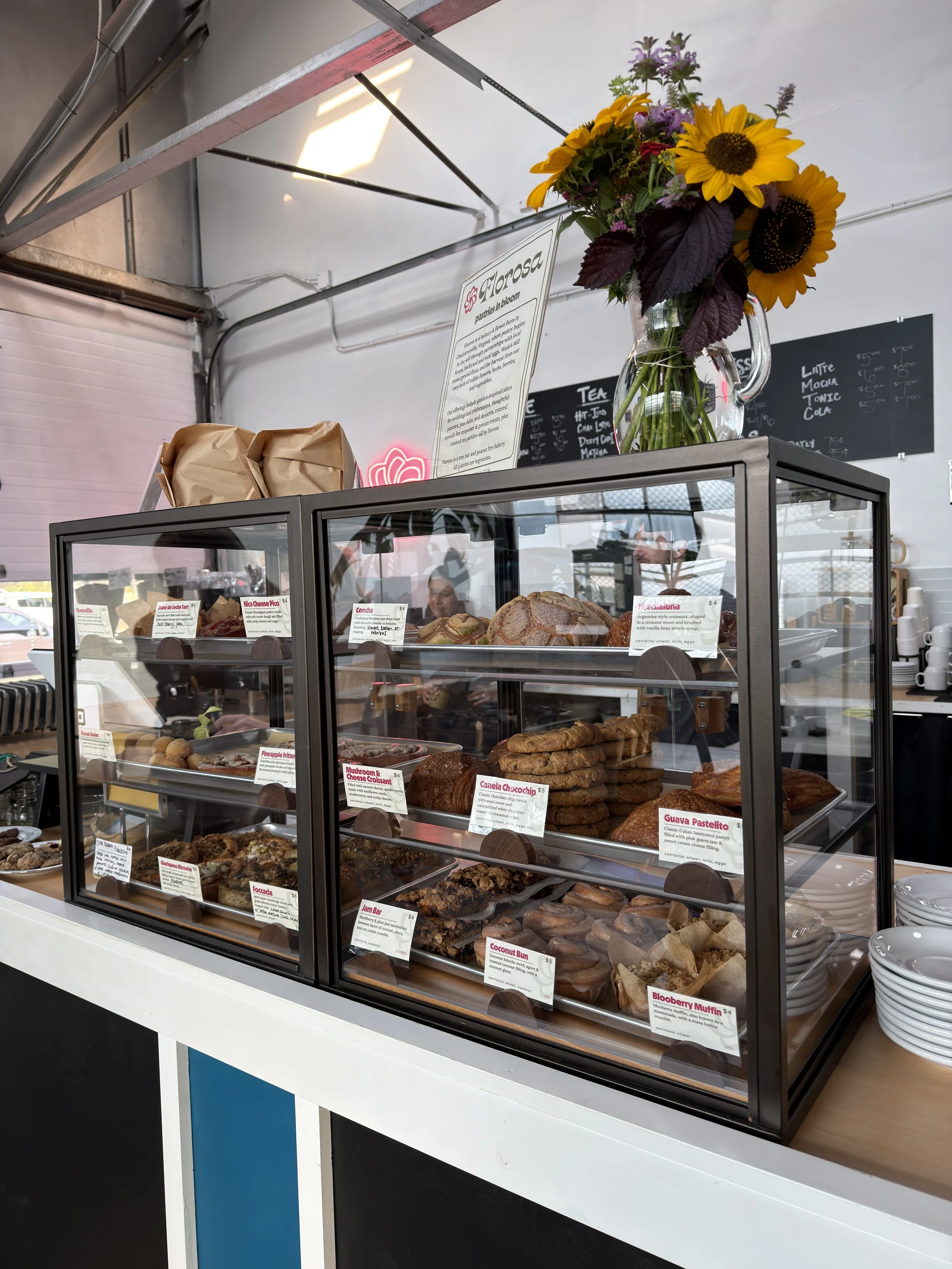 Florosa's weekend pastry case at JBird supply, featuring pan dulce and pastries made with local flour, produce, and eggs from local farms.