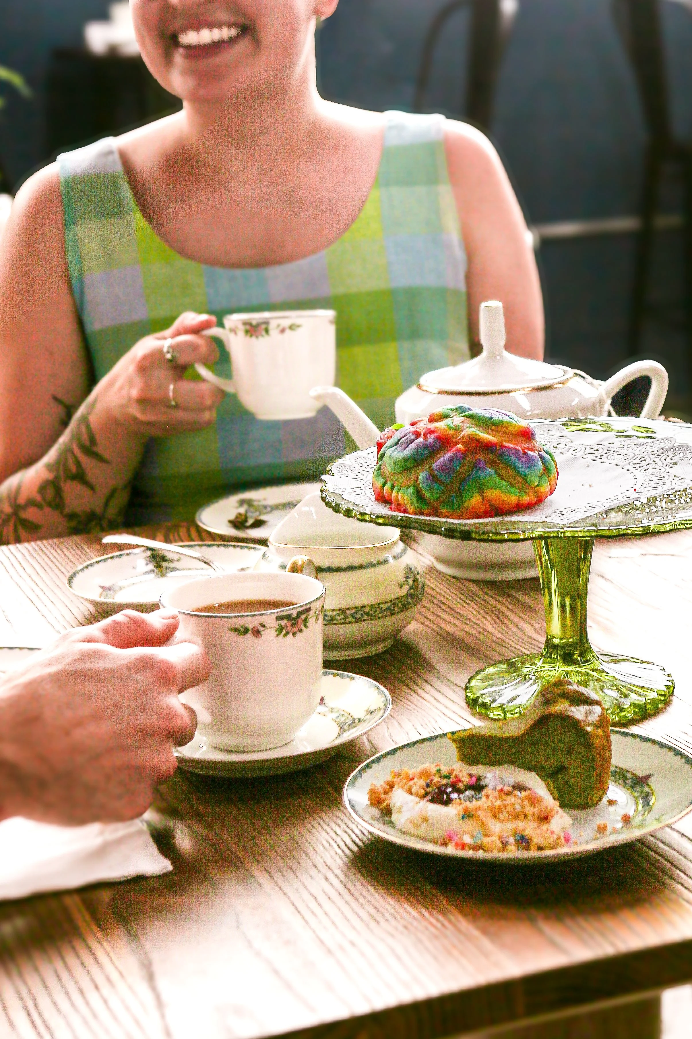 Tea Party Guests enjoying tea at a pride themed Florosa tea party