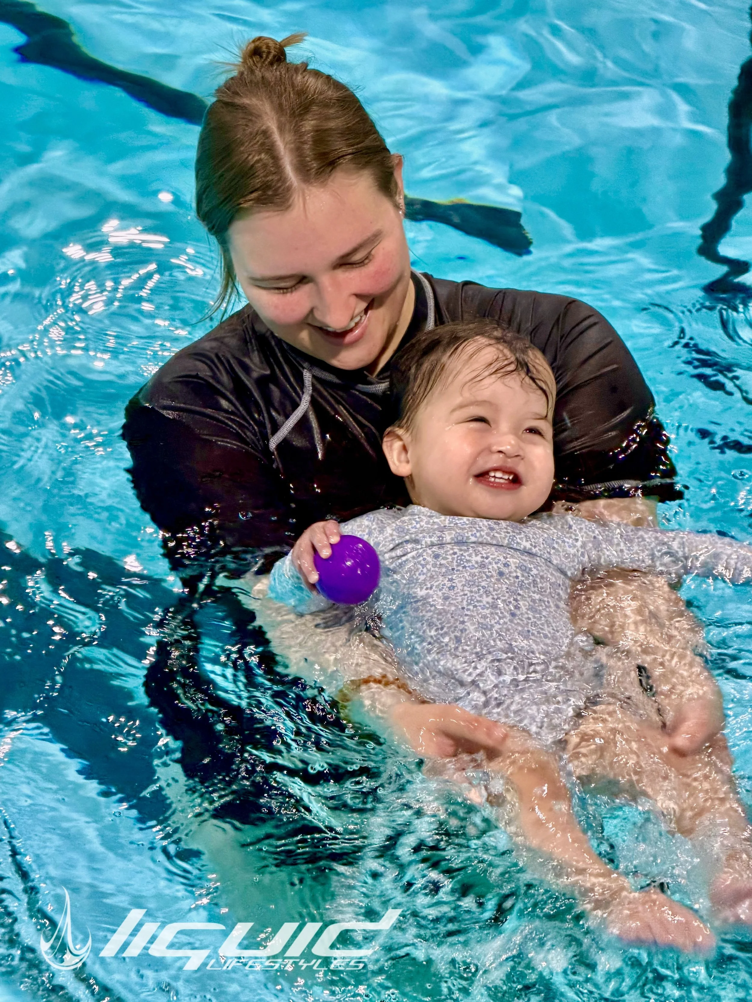 Always smiling.
Always relaxed.
Always holding her favorite purple ball. 💜✨

#LiquidLifestyles #BabyBubbles #HappySwimmers #WaterConfidence #SkillsForLife