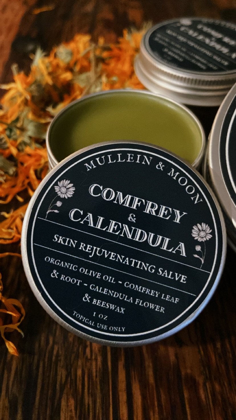 Herbal oil salve with comfrey and calendula for promoting healing, reducing inflammation, and soothing dry, irritated skin, cuts, and bruises