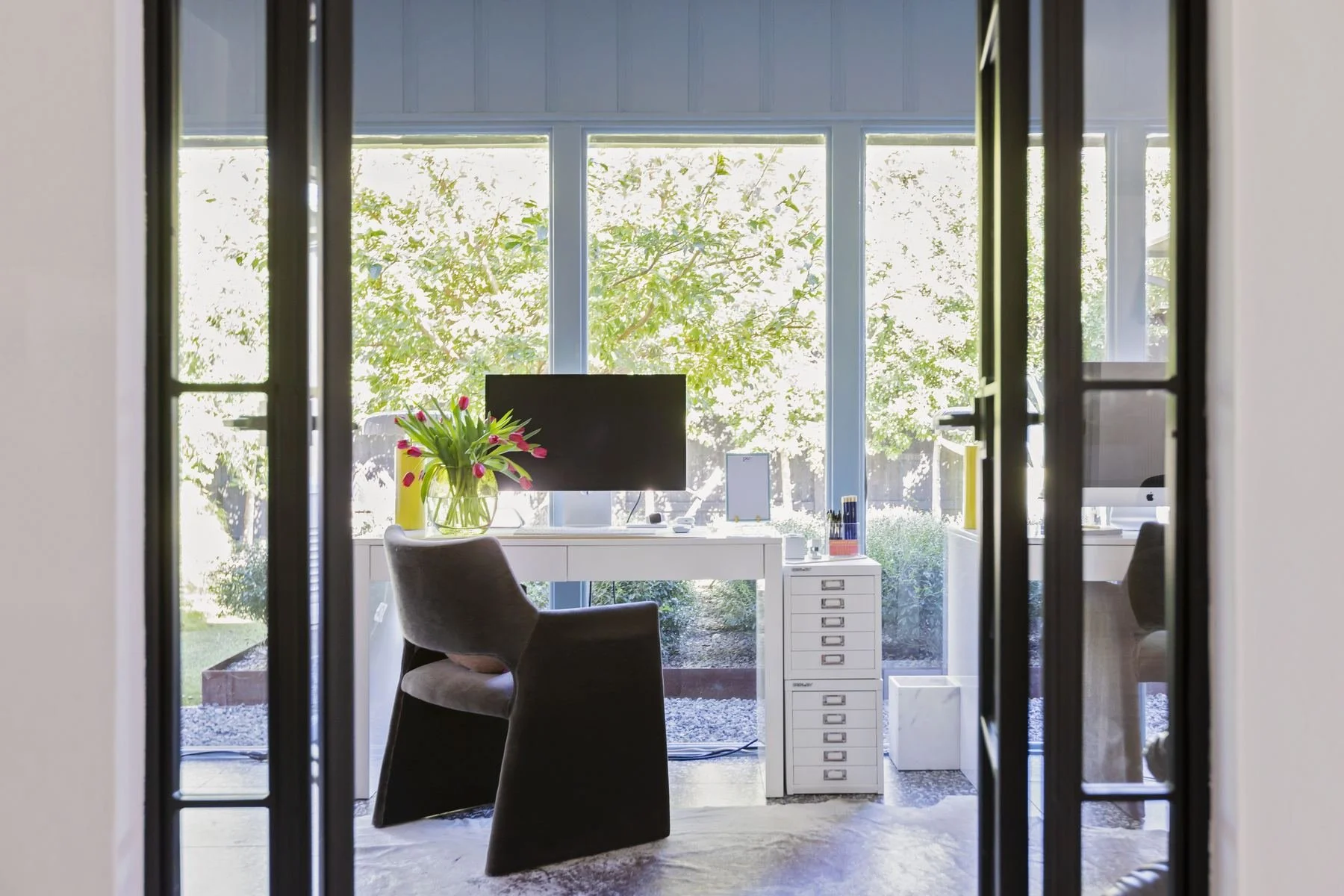 CREATIVE HOME OFFICE A former catch-all room became a bright, inspiring workspace for a growing Houston event planning business.  