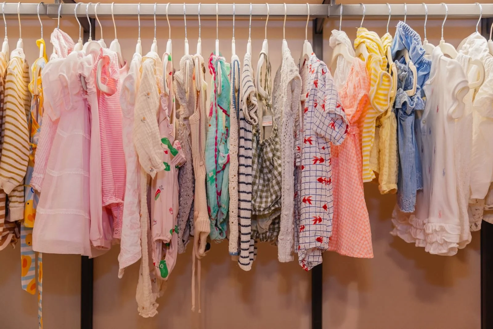 color-sorted-baby-clothes-velvet-hangers.jpg