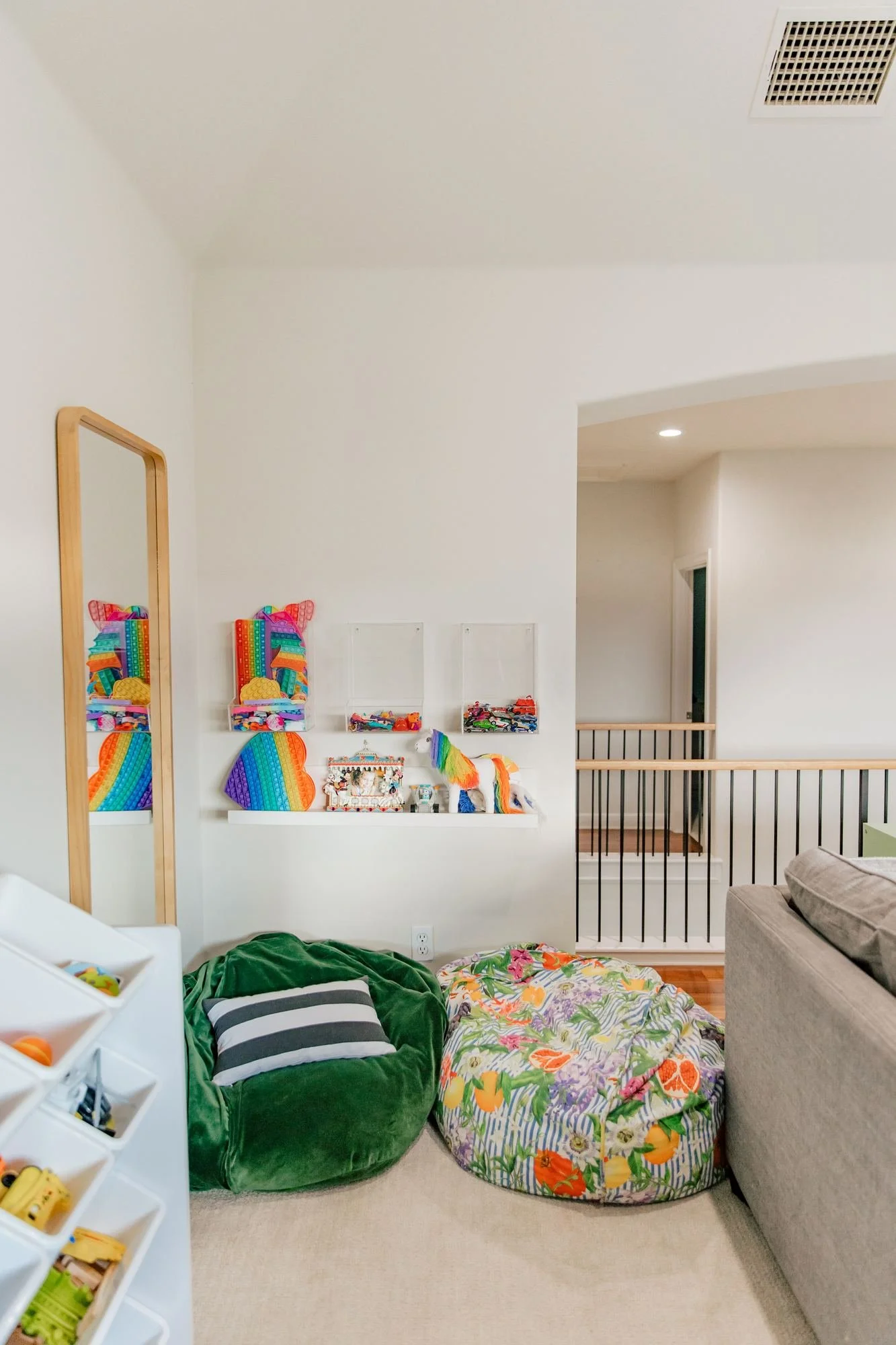 playroom-reading-nook-bean-bags-acrylic-toy-bins.jpg
