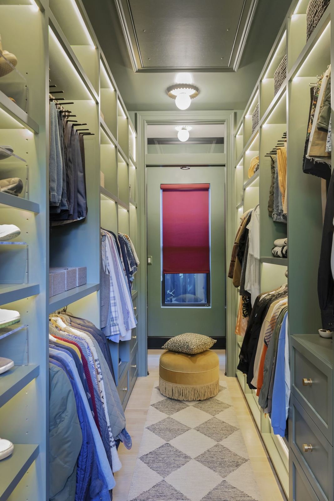 houston-boutique-style-walk-in-closet-green-cabinetry.jpg