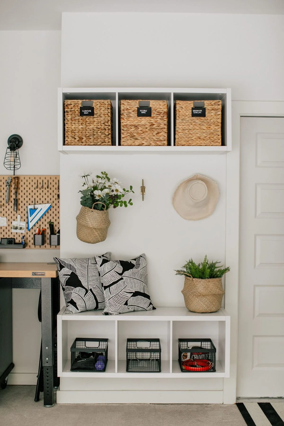 garage-mudroom-drop-zone-bench-labeled-baskets.jpg