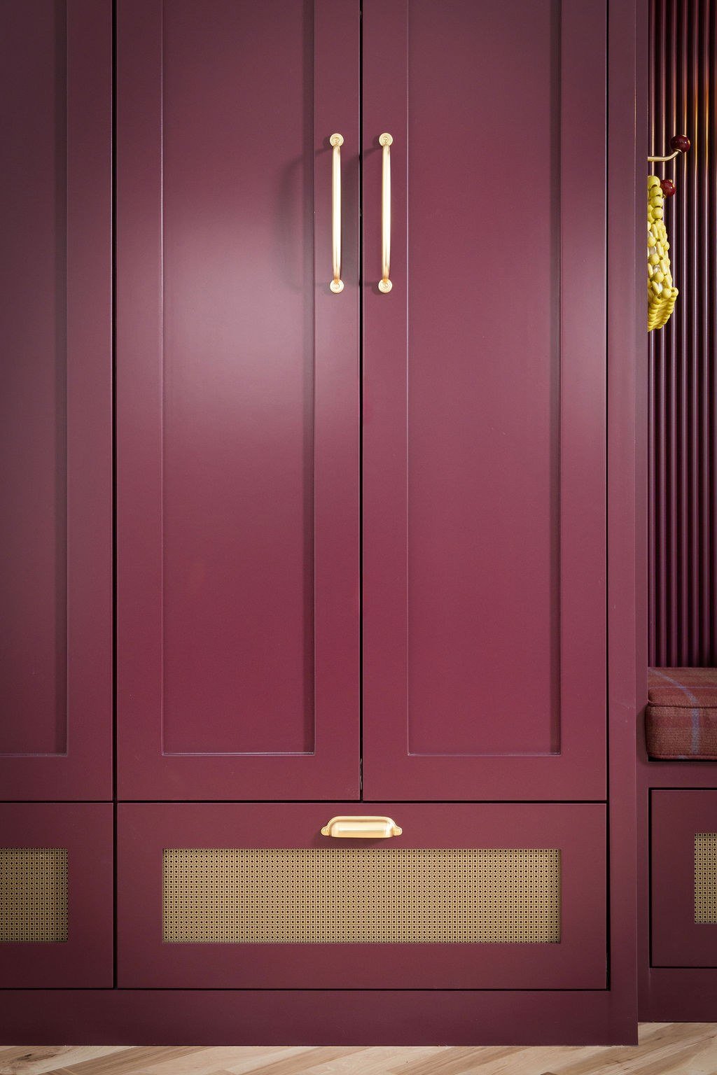 custom-cabinetry-brass-pulls-cane-drawer-detail.jpg