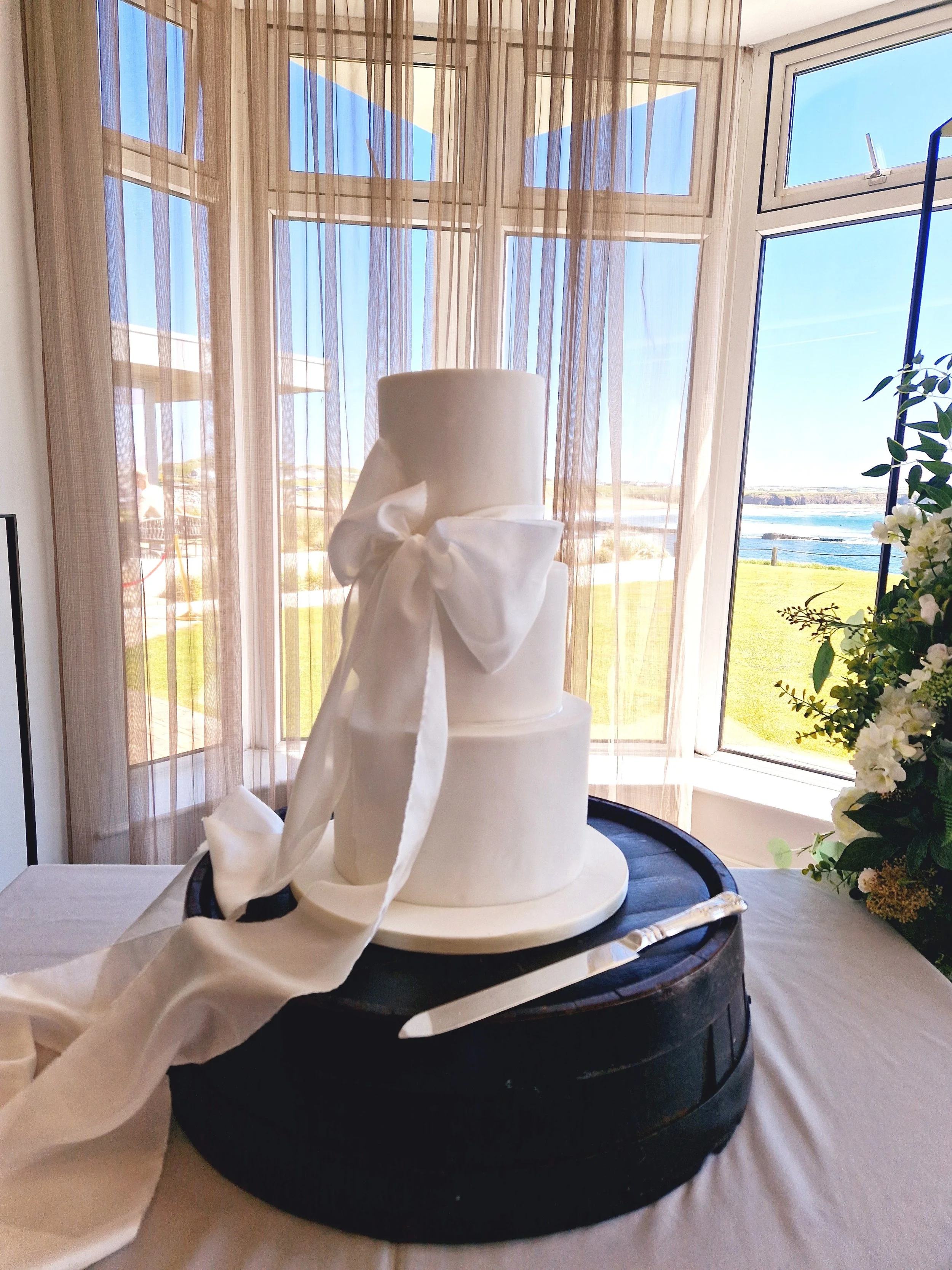 Silk Bow Wedding Cake.jpg