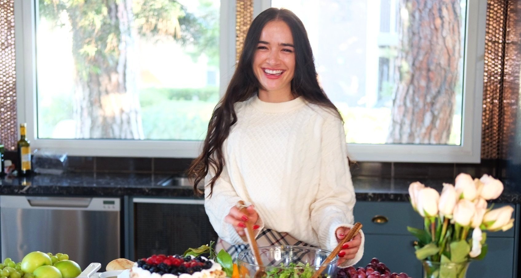 Image shows registered dietitian, Emily, preparing a meal. Button at the center says "let's connect" which opens an email draft to Emily Hamocon, Dietitian.