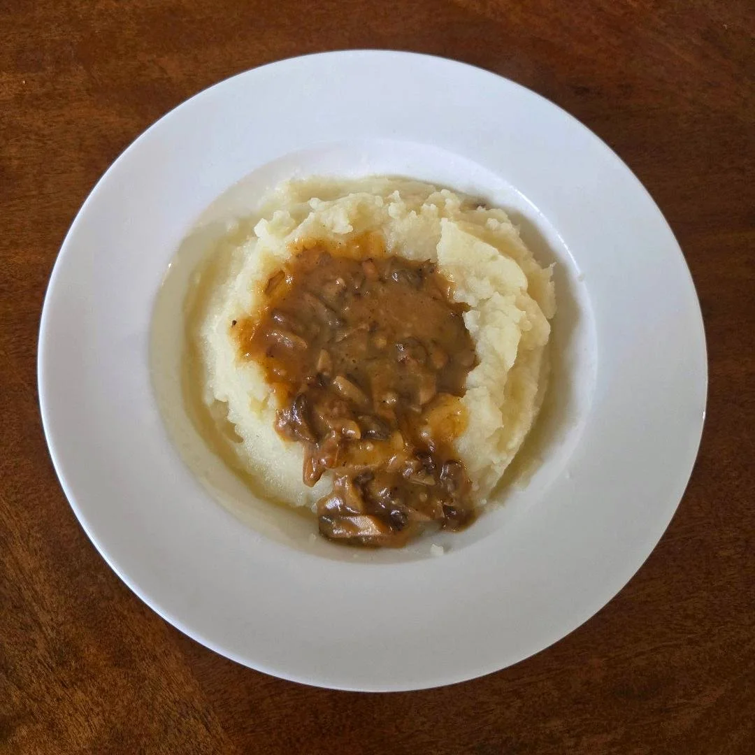 Mashed potatoes with mushroom gravy
