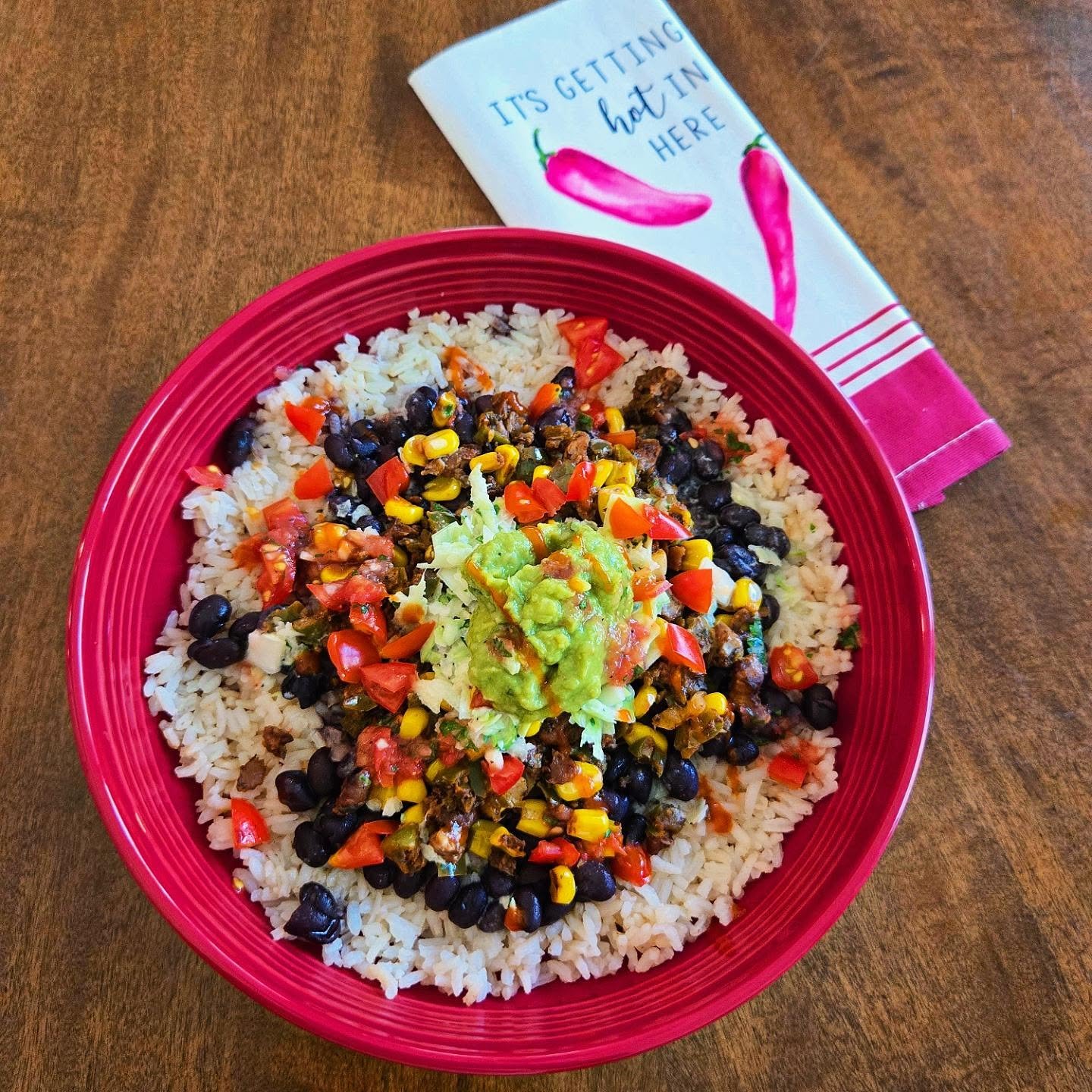 Spicy Veggie &amp; Rice Bowl 

Last night's leftovers easily transformed into today's lunch. I removed the taco shells and made rice and black beans the base of the bowl. Some bell pepper, onion, and corn added more flavor for the next layer, but the