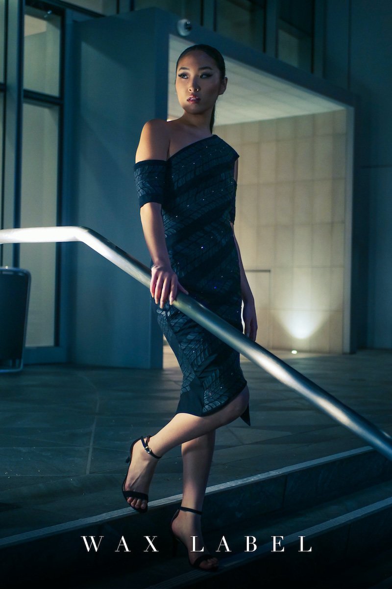 Photoshoot Sleek Makeup Eyeliner for Wax Label walking down the stairs in evening