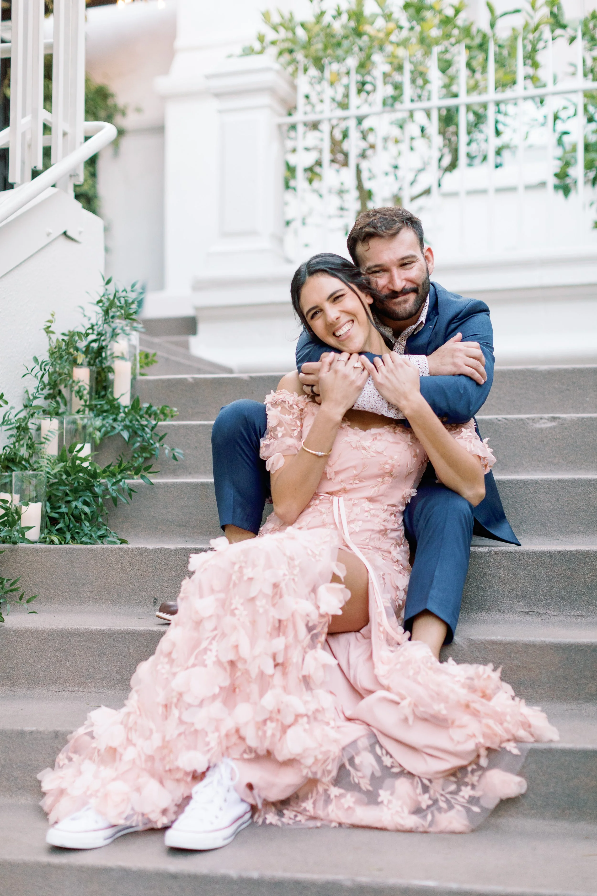 bride and groom posing at wedding redbird venue