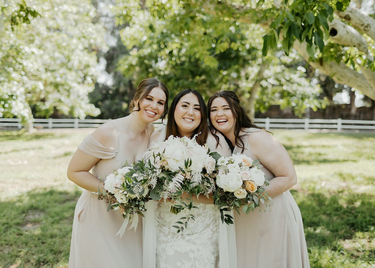  Bride posing with her friends  