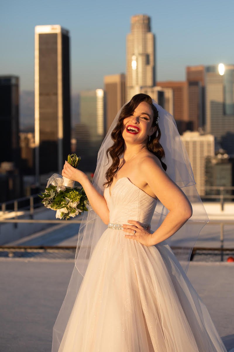  bride giving laughs at sunset downtown los angeles 