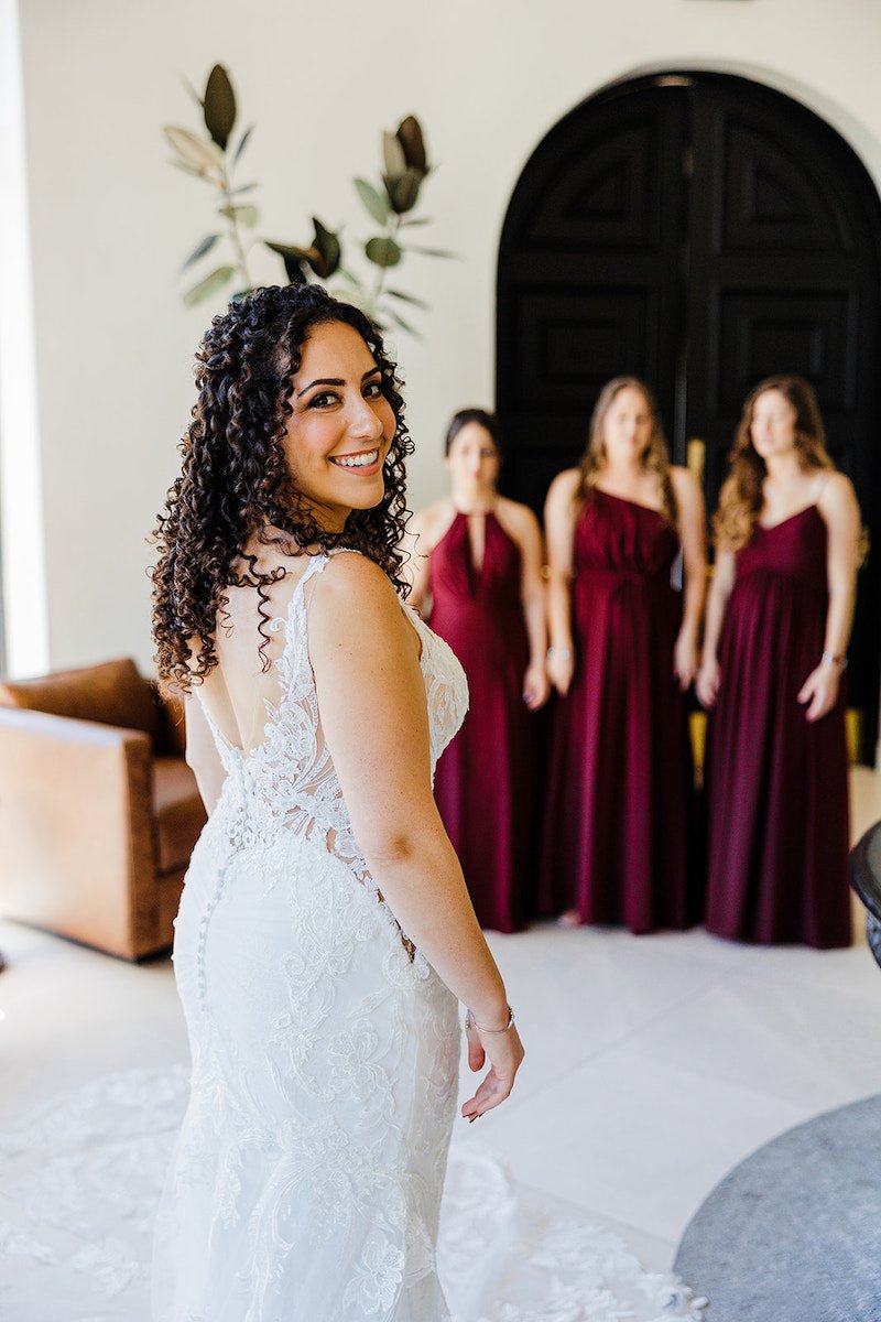 Curly Haired Bride with Bridal Party