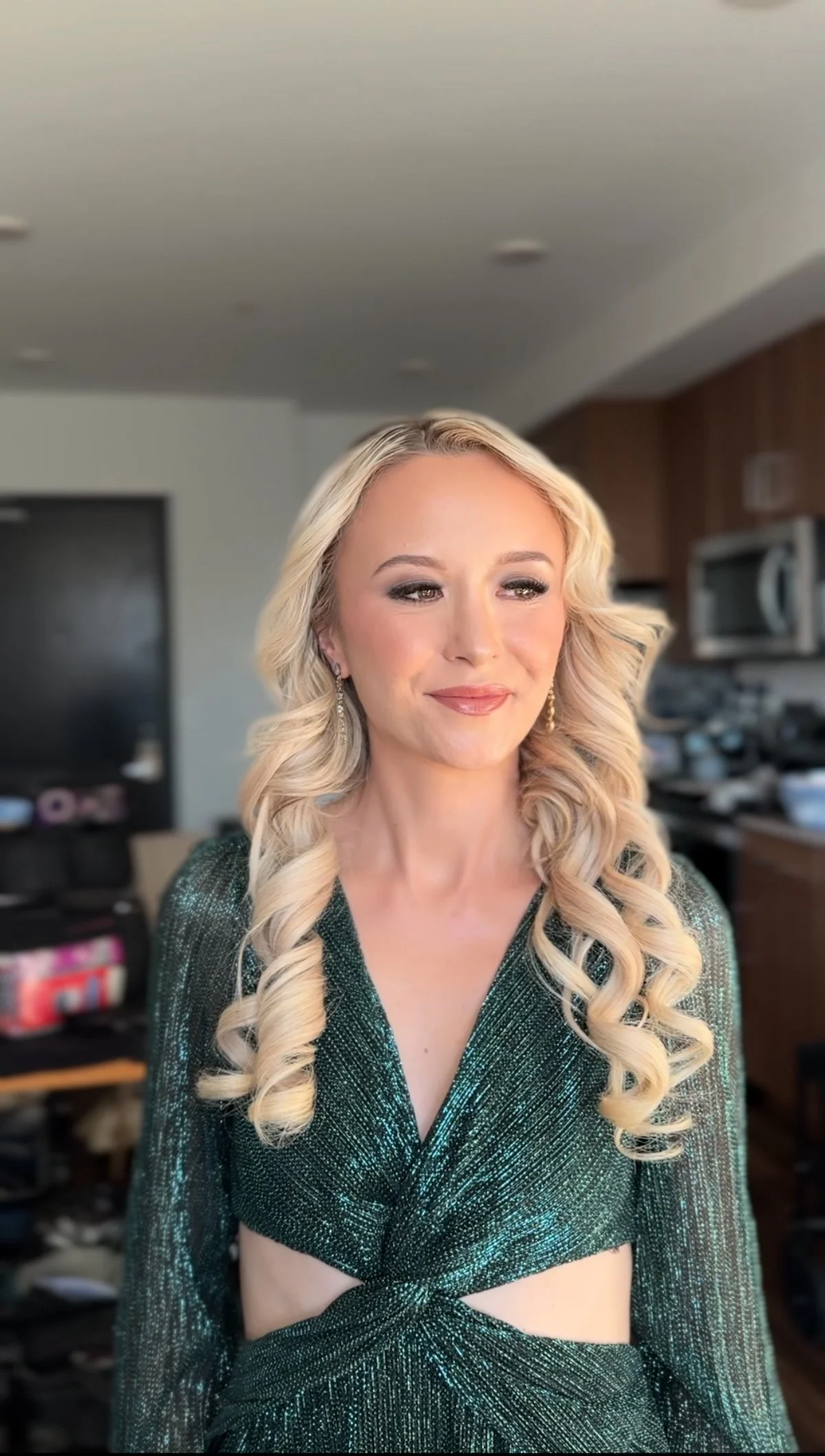 red carpet premiere soft glam makeup and curls down hairstyling