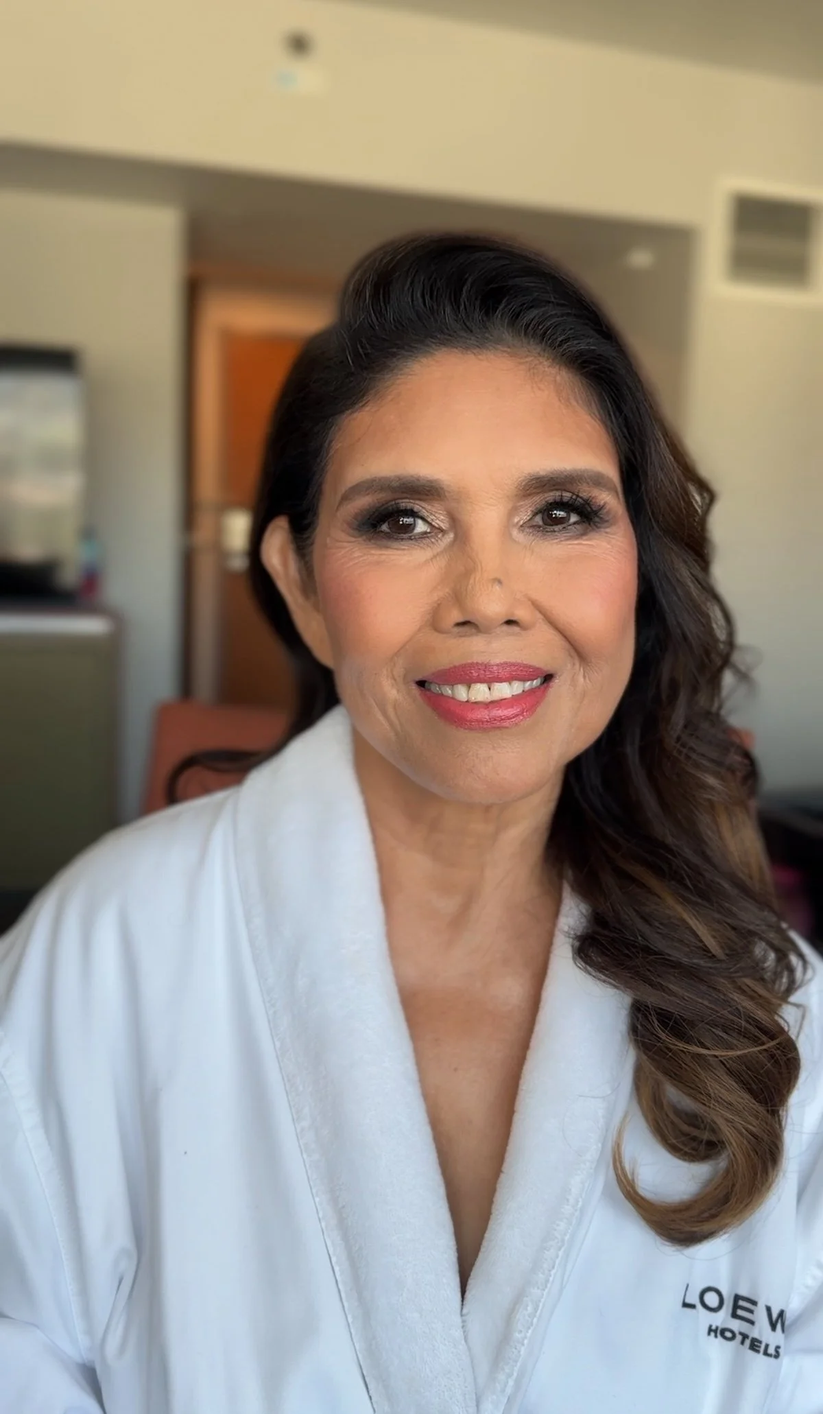 Gala makeup and hairstyling for mature beauty