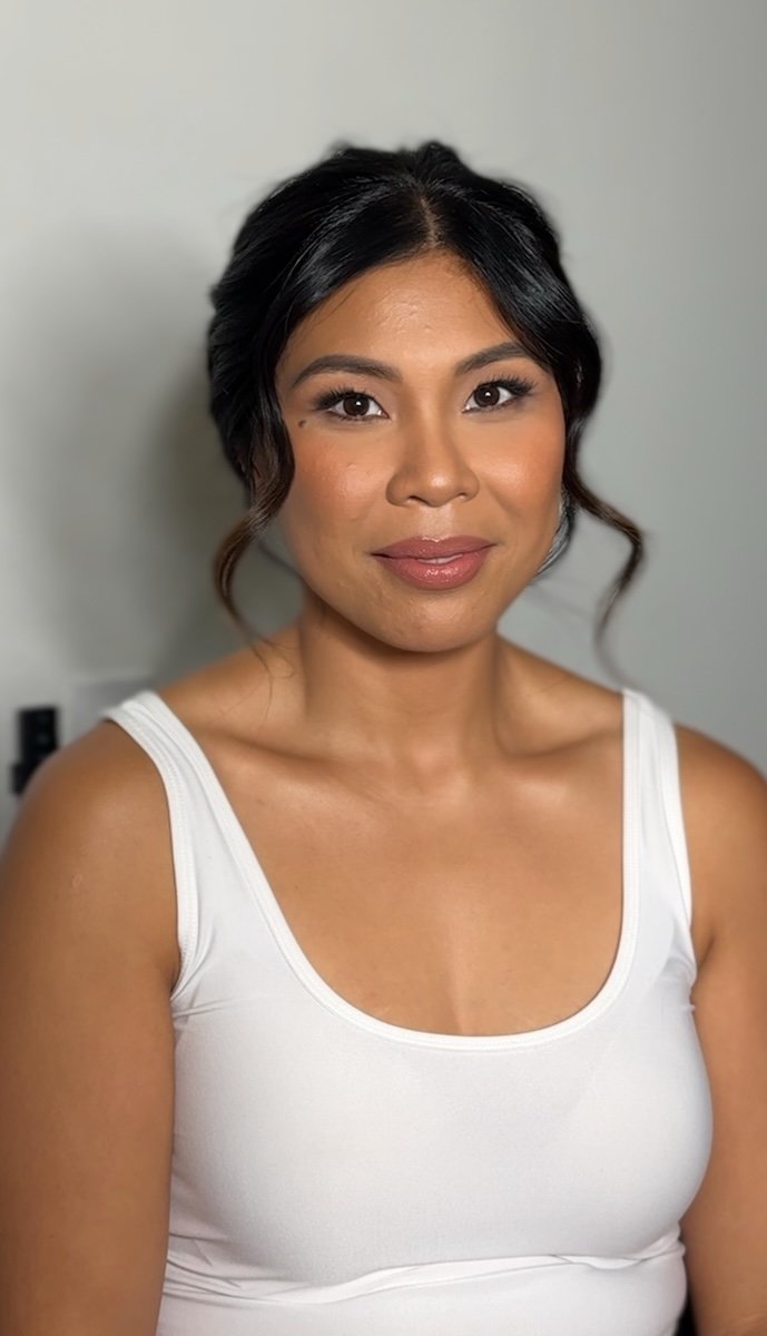 anniversary celebration makeup and hairstyling for dark hair and gorgeous bronzy skin, flushed cheeks and a soft eye makeup