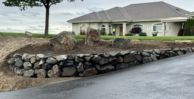 Inland Rockworks installs rock retaining walls for personal homes and businesses throughout Spokane, Tri-Cities and the Pacific Northwest.  (Walla Walla, Wenatchee, etc.)