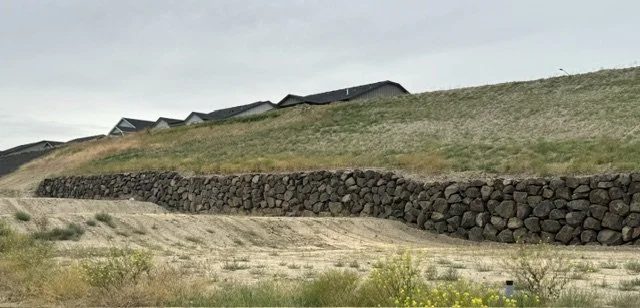 Inland Rockworks installs rock retaining walls for personal homes and businesses throughout Spokane, Tri-Cities and the Pacific Northwest.  (Walla Walla, Wenatchee, etc.)