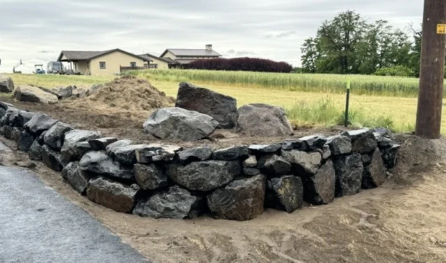 Inland Rockworks installs rock retaining walls for personal homes and businesses throughout Spokane, Tri-Cities and the Pacific Northwest.  (Walla Walla, Wenatchee, etc.)