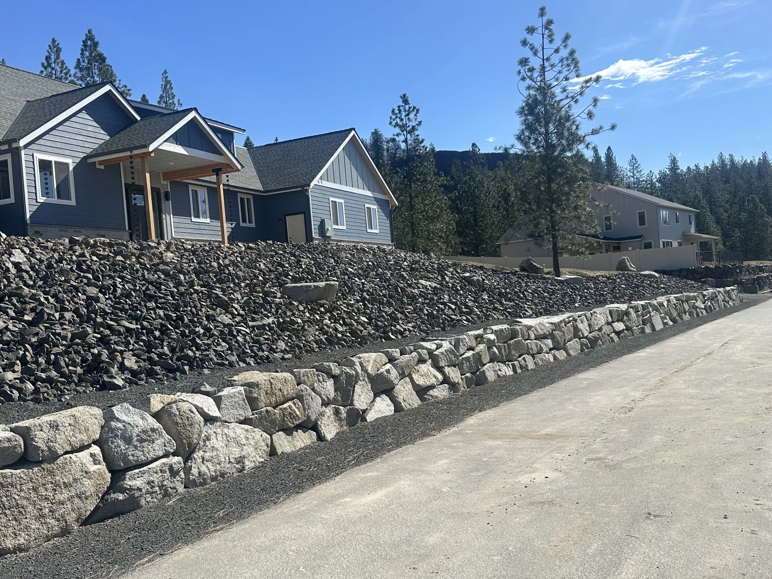 Granite boulder retaining wall